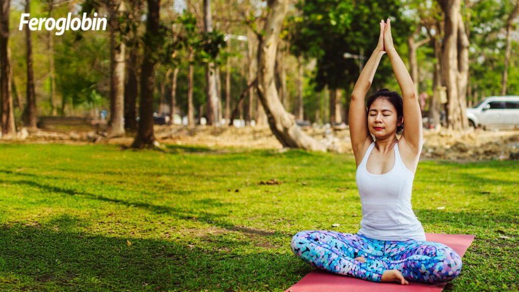 a women doing yoga - Vitabiotics India